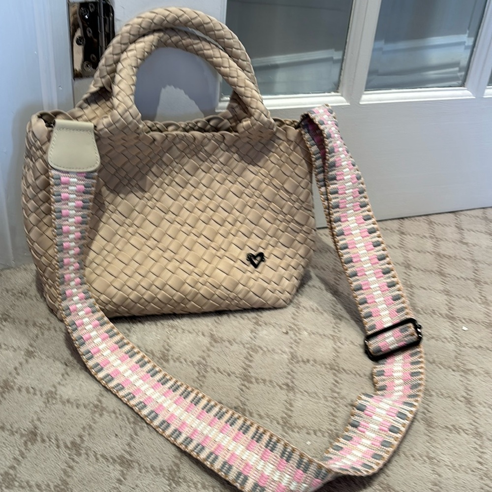 Woven nylons like crossbody with makeup bag included.